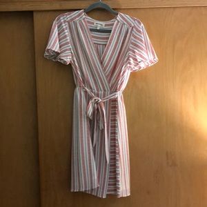 White, pink, and blue striped knee length dress